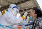 China tests millions after coronavirus flareups in 3 cities